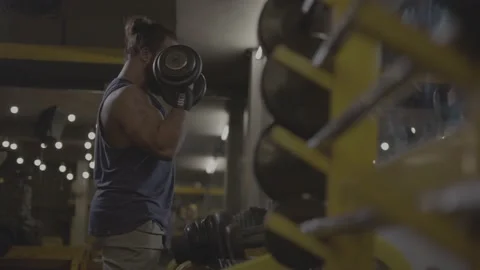 S-Log. professional athlete bodybuilder working out in the indoor gym. weight Stock Footage 162661733