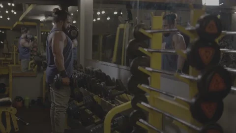 S-Log. professional athlete bodybuilder working out in the indoor gym. weight Video stock 162661785