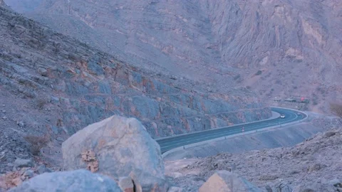 S shape mountain road and car coming in front view Stock Footage 159646057