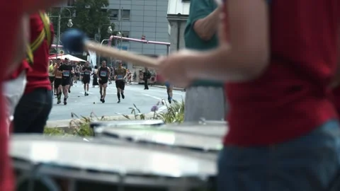 S25 Berlin Focus Shift Drums to Runners Slow Motion May 2023 Stock Footage 332126563