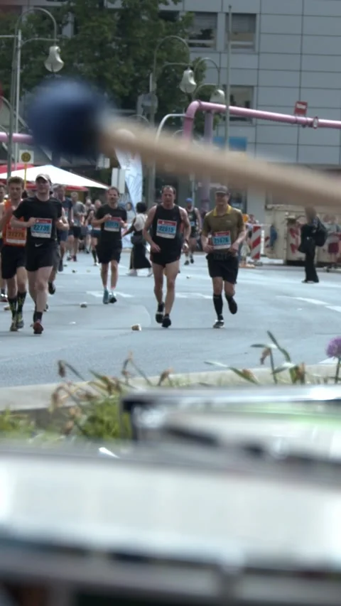 S25 Berlin Focus Shift Drums to Runners Slow Motion May 2023 Stock Footage 332132188