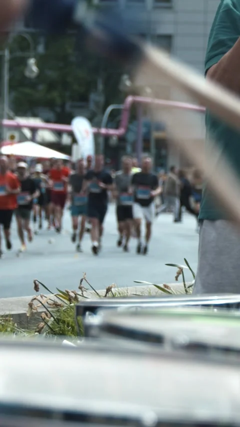 S25 Berlin Focus Shift Drums to Runners Slow Motion May 2023 Stock Footage 332132189