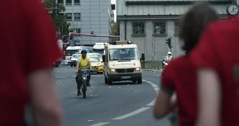 S25 marathon event team vehicles support convoy Berlin 2023 Stock Footage 332125532