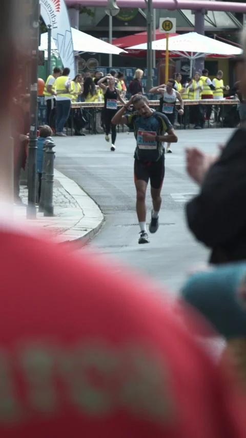 S25 marathon POV spectators drummers cheering Berlin 2023 Stock Footage 332132310