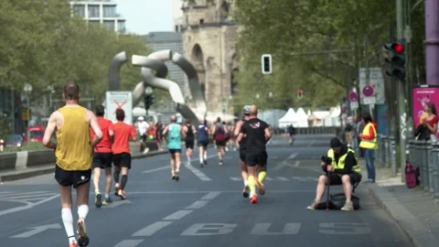 S25 marathon rack focus runners slow motion Berlin 2023 Stock Footage 332126393