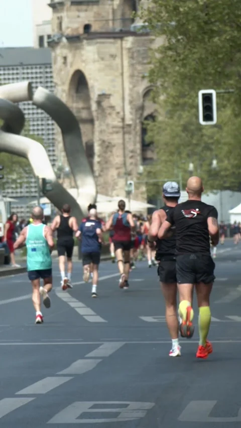 S25 marathon rack focus runners slow motion Berlin 2023 Stock Footage 332132122