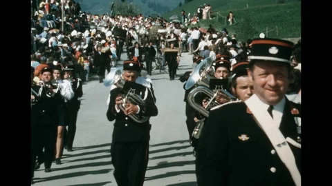 S8 - SWITZERLAND - marching bands parading désalpes ceremony - Charmey - 1974 Stock Footage