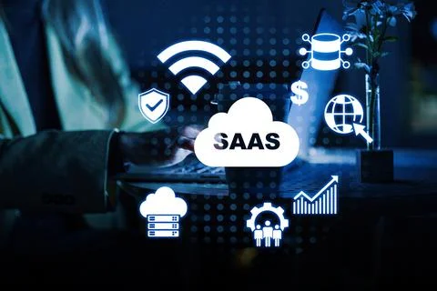 Saas software concept with icons showing features and a person using a laptop Stock Photos