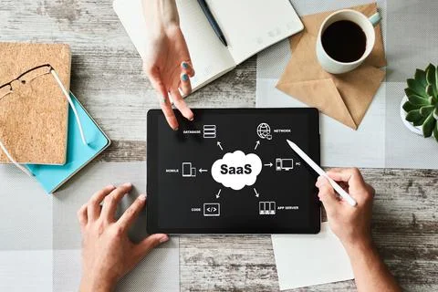 SaaS - software as a service. Internet and technology concept. Stock Photos