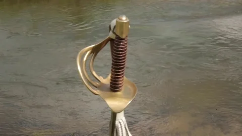 Saber stuck in the ground Stock Footage 78144827