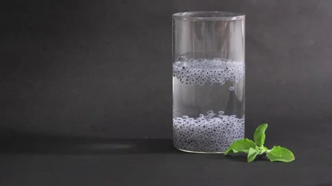 Sabja or sweet basil seeds soaked in water in a glass. Consuming this has m.. 스톡 동영상 271170947