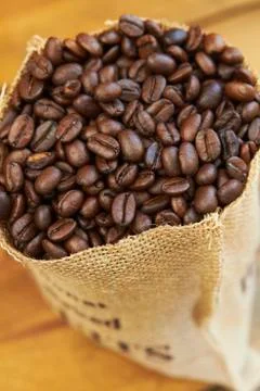 Sack of coffee beans Stock Photos