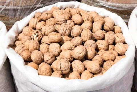 Sack of walnuts - Close up. Stock Photos