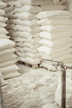 Sacks of flour in the bakery warehouse Stock Photos