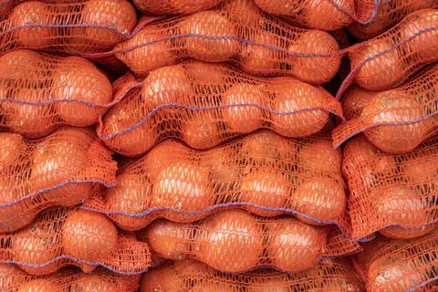 Sacks Of Onions Background Stock-Fotos