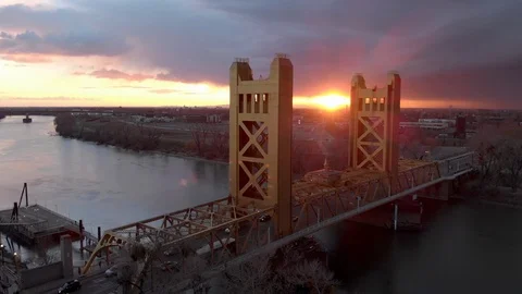 SACRAMENTO AERIAL DRONE FLYOVER OF TOWER BRIDGE AT SUNSET Stock Footage