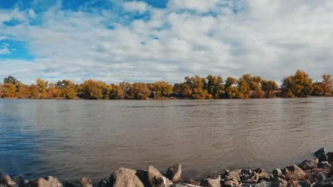 Sacramento river view time lapse in fall from shore Stock Footage 293425633