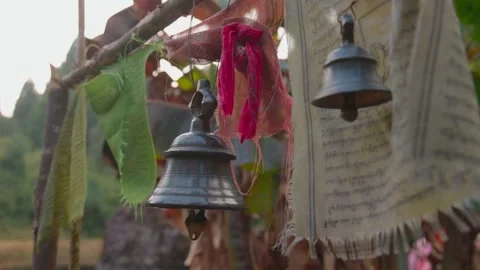 Sacred bell in the forest with Buddist Prayer Flag Stock Footage 281231799