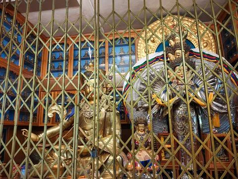 Sacred Buddhist Deities and Multi-Faced Statue Inside a Monastery in Dharamshala Stock Photos