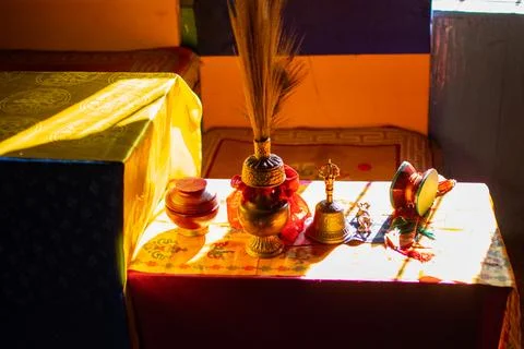 Sacred Buddhist religious objects for prayer put together, inside peaceful Bu Stock Photos