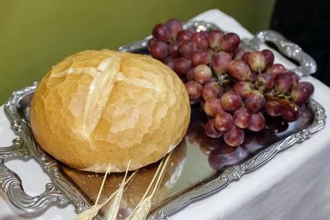 Sacred Elements of the Holy Supper with Bread and Grapes on Polished Metal Tr Stock Photos