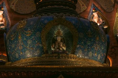 Sacred Interior with Statues interior ceiling statues deity guardians Stock Photos