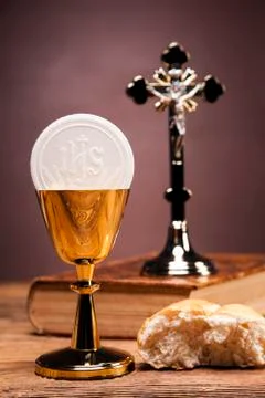 Sacred objects, bible, bread and wine. Stock Photos