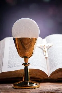 Sacred objects, bible, bread and wine. Stock Photos