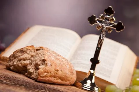 Sacred objects, bible, bread and wine. Stock Photos