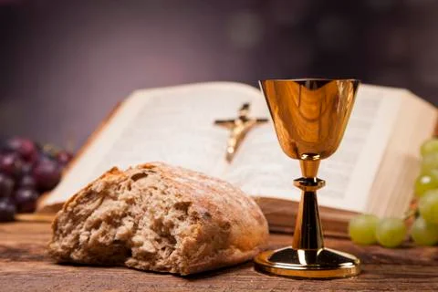 Sacred objects, bible, bread and wine. Stock Photos