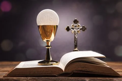 Sacred objects, bible, bread and wine. Stock Photos