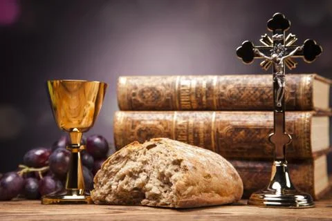 Sacred objects, bible, bread and wine. Stock Photos