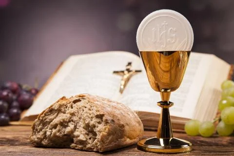 Sacred objects, bible, bread and wine. Stock Photos