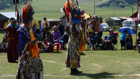 A sacred religious dance in a distant Mongolian monastery. Stock Footage 132286974