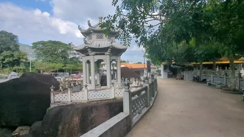 Sacred Stroll: A Tranquil Journey Through the Revered Kek Lok Si Temple Stock Footage 248962671