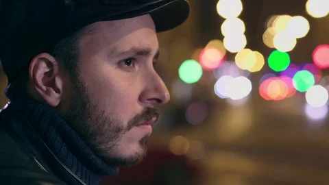 Sad And Pensive  Man Deep In His Problem With city night Background Stock Footage 74691294