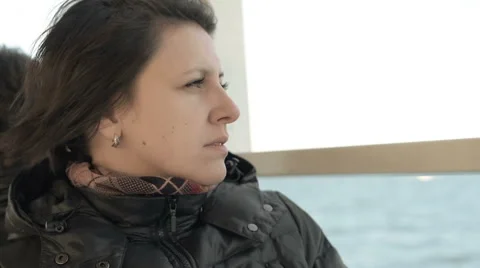 Sad and pensive mood : Close up beautiful green eyed passenger woman Stock Footage 49585331
