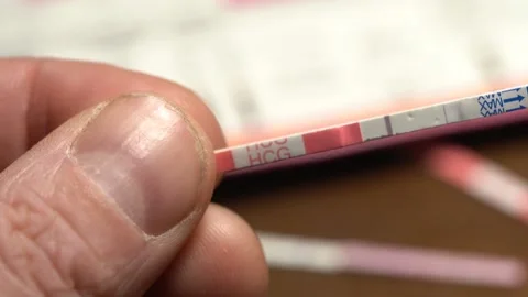 Sad and Upset Dad With One More Negative Pregnancy HCG Test - Close Up Video stock 228355906