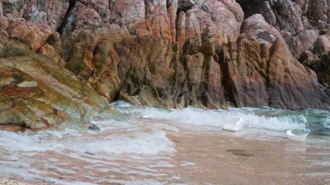Sad beach. View of beach littered with plastic waste, sending our planet into Stock Footage 244316704