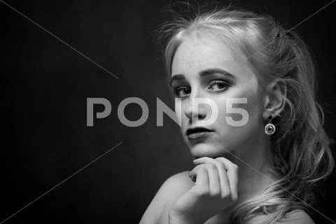 Sad blond gir Stock Photos