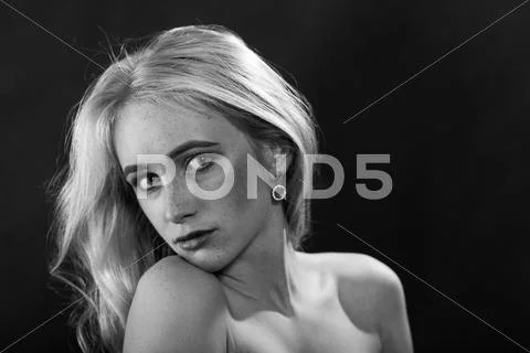 Sad blond woman Stock Photos