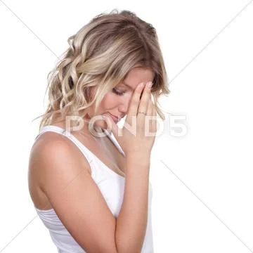 Sad blonde young woman Stock Photos
