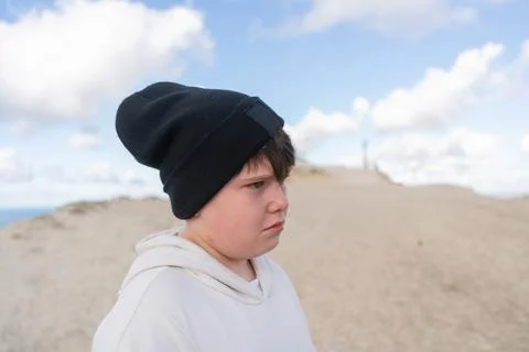 Sad Boy in a Black Hat Stock Photos