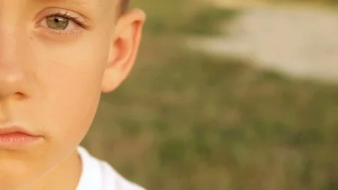 Sad boy close-up, half face Stock Footage 84985394