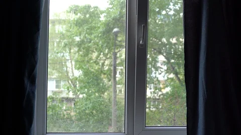 Sad boy at home keeping a distance and self-isolation you need to stay at home Stock Footage 129899161