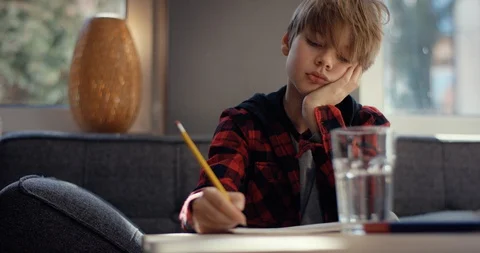 Sad boy at homeschool Video stock 128752199