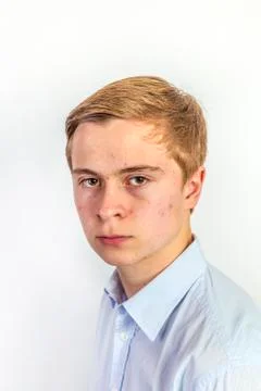 Sad boy looking at camera Stock Photos