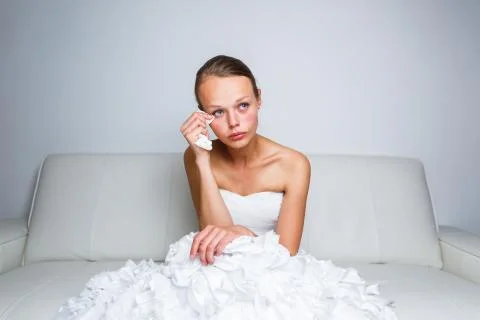Sad bride crying, smitten, feeling low and depressed Fotos de archivo