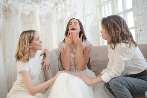 Sad bride crying, smitten, feeling low and depressed Stock Photos