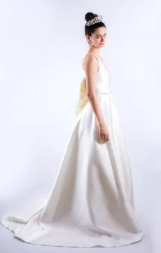 Sad bride. Isolated gray background. Grumpy bride. Sad and disappointed hesit Stock Photos